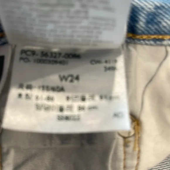 Levi’s 501 denim Buttonfly denim shorts. High-rise, intentionally, distressed.