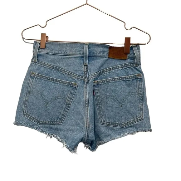 Levi’s 501 denim Buttonfly denim shorts. High-rise, intentionally, distressed.