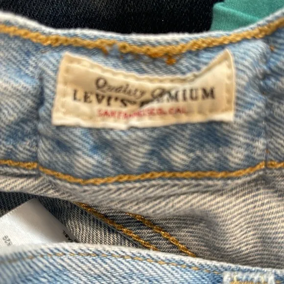 Levi’s 501 denim Buttonfly denim shorts. High-rise, intentionally, distressed.