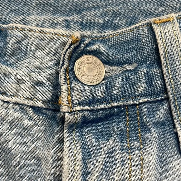 Levi’s 501 denim Buttonfly denim shorts. High-rise, intentionally, distressed.