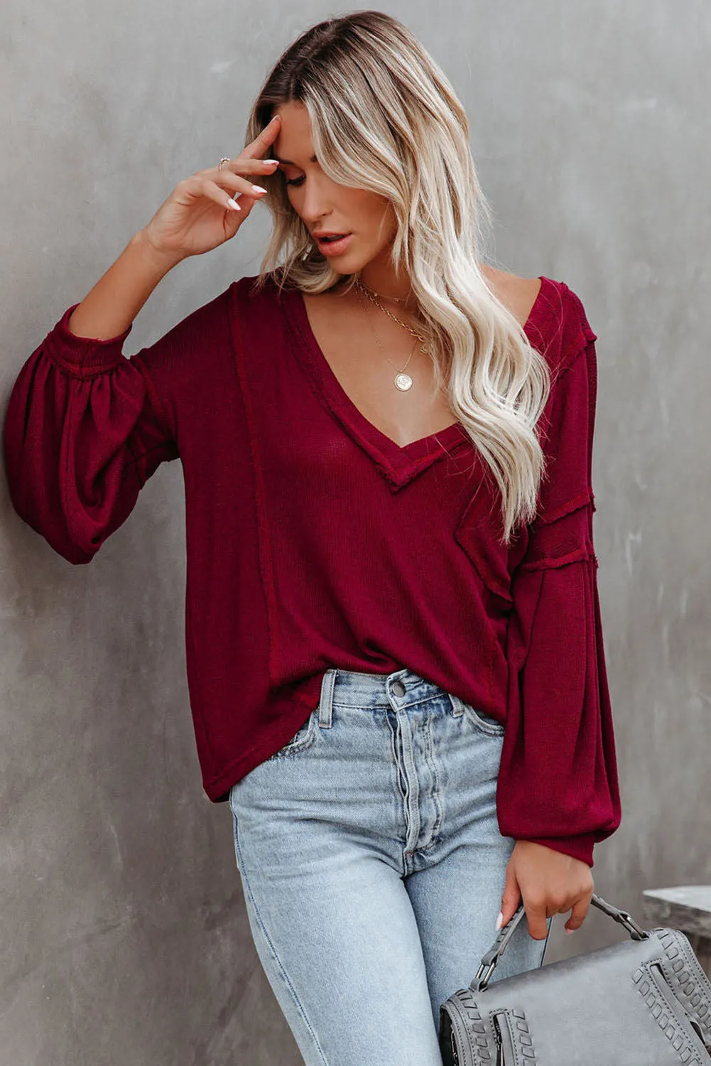 Red Exposed Seam Lantern Sleeve V Neck Knit Top