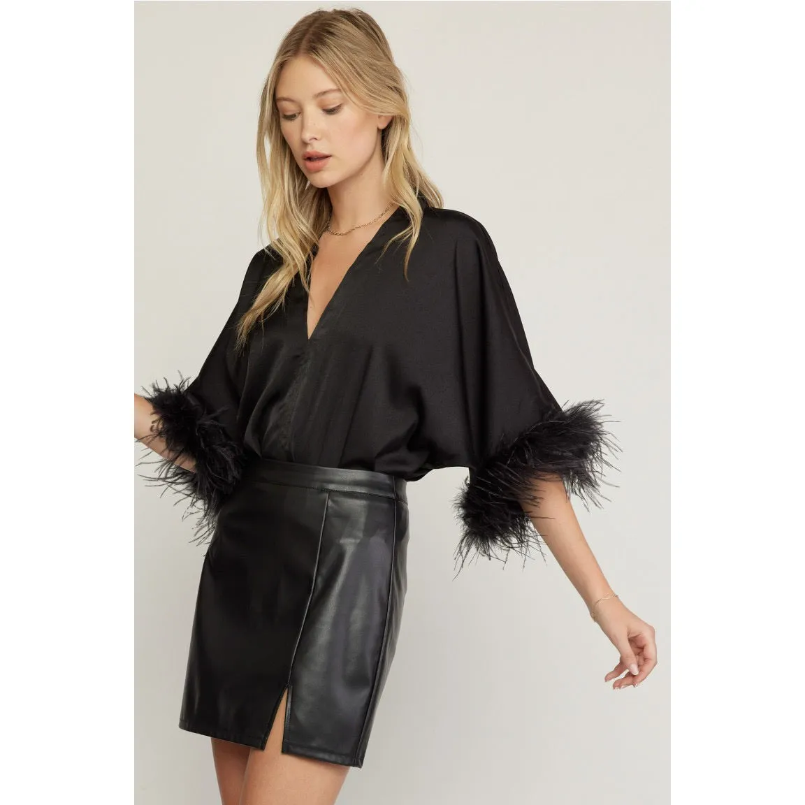 The Executive Ostrich Lined Body Suit in Black