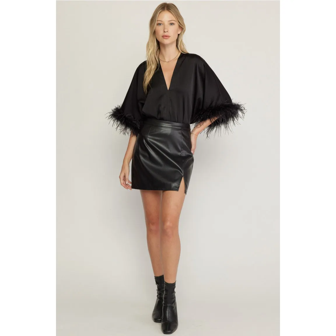 The Executive Ostrich Lined Body Suit in Black