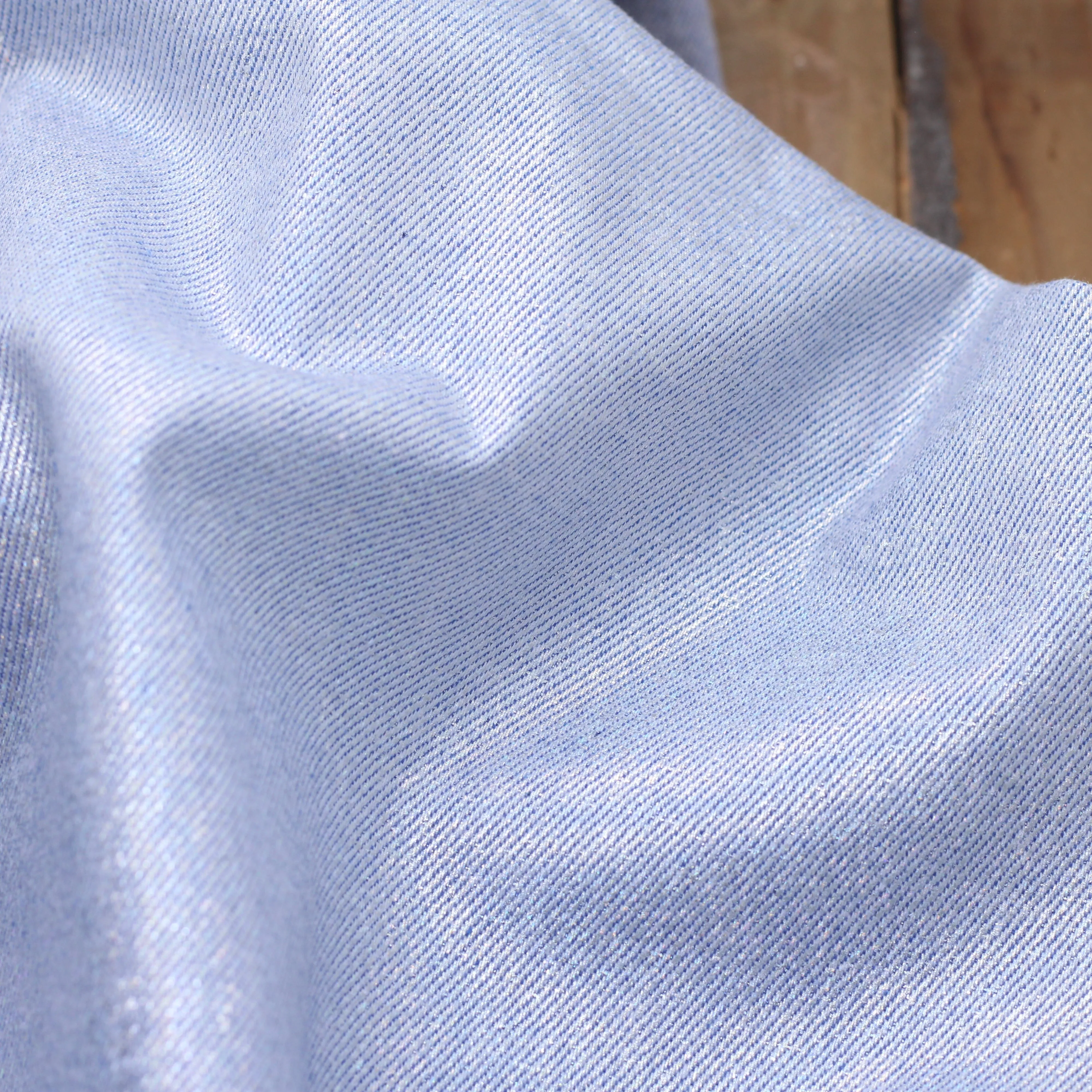 Tissu Jean - Bleu clair irisé Argent (Vendu x10cm)